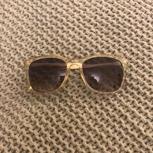 Clear sunglasses with gold details